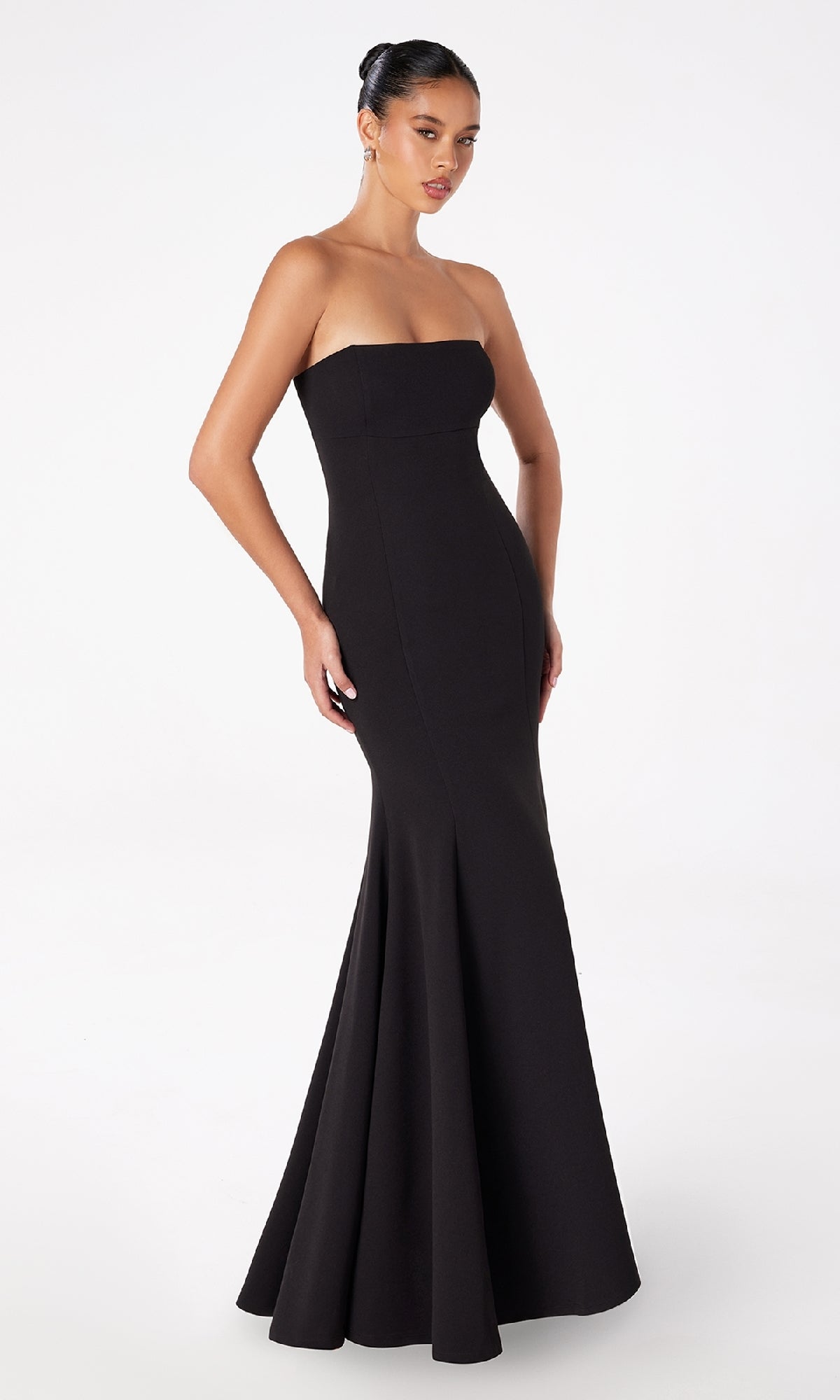 Woman in a black Lace-Up Strapless Long Prom Dress (Astee T2010) with a fitted bodice and flared hem, standing against a plain white background.